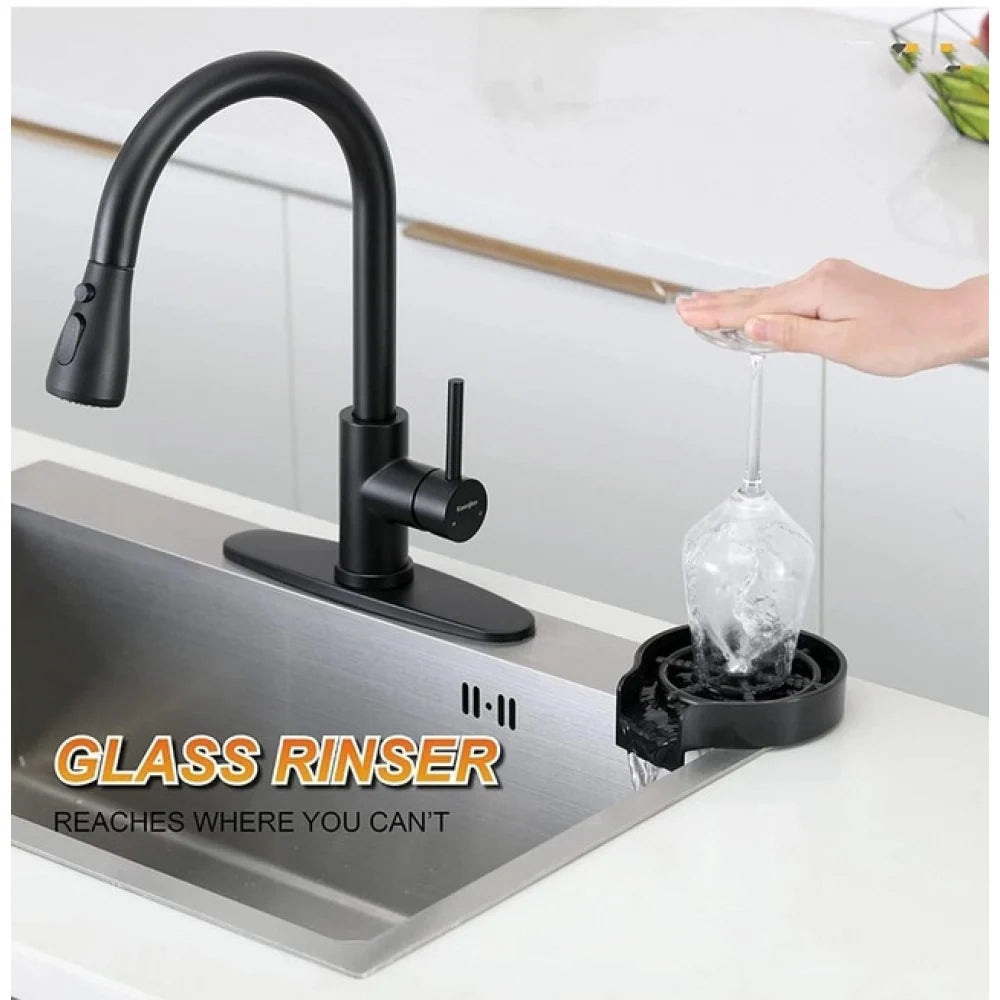 Cup rinser fitted beside the tap in a kitchen sink