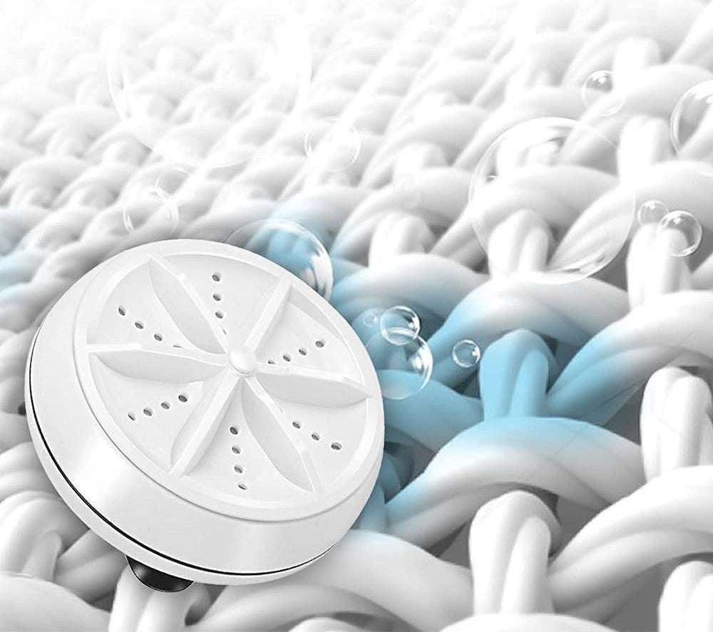 Mini portable washer on soft fabric
