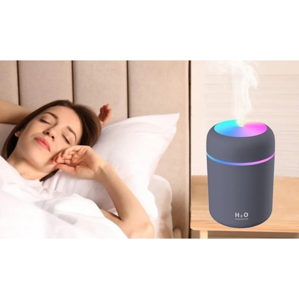 Mini humidifier beside the bed while sleeping