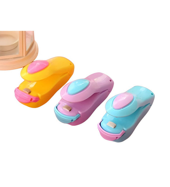 Three colourful mini heat sealers