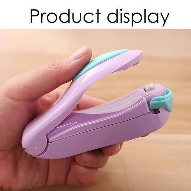 Holding the compact mini bag sealer
